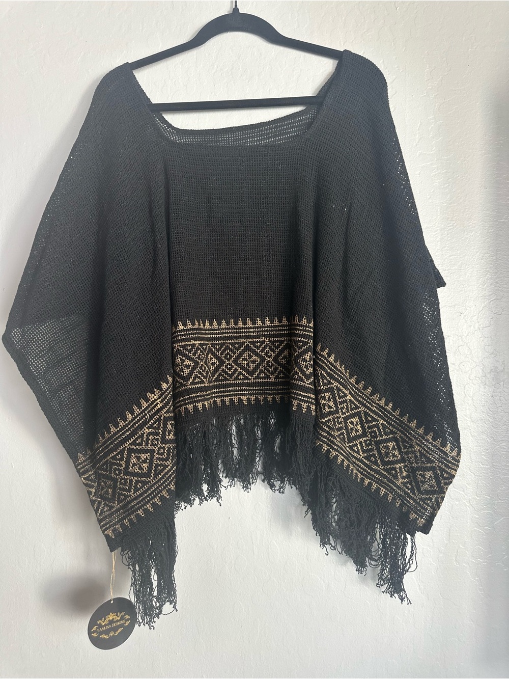 Black Fringe Knit Poncho with Gold Geometric Trim